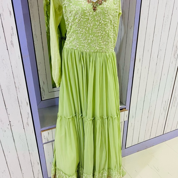 Full flaired beautifully embroidered pastel green gown for party wear - Picture 5 of 11